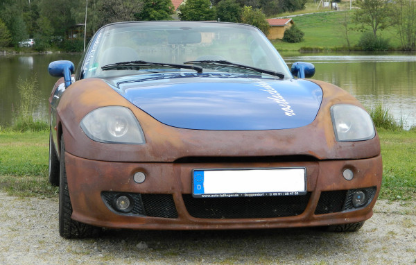 Fiat Sportwagen Kotflügel rostig im Ratlook lackiert